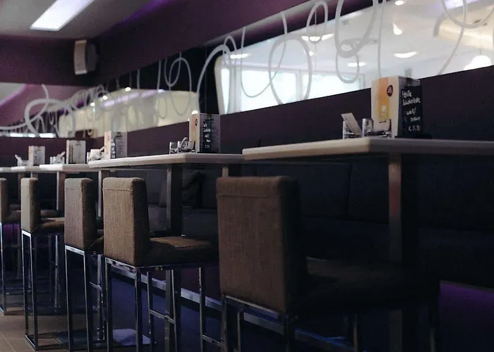 Iris Porsche & Restaurant Отель 4*